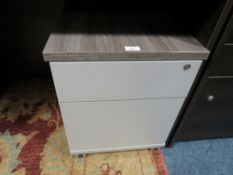 A MODERN OFFICE TWO DRAWER FILING CABINET