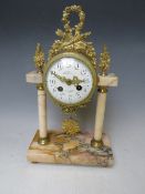 A 19TH CENTURY FRENCH GILT MANTEL CLOCK, the enamel dial marked 'Comptoir General Schnere', H 37 cm,