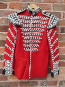 A GRENADIER GUARDS DRUMMERS RED PARADE TUNIC, GG drummers decoration to chest and Queens crown