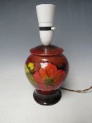 A MOORCROFT FLAMBE ORCHID PATTERN TABLE LAMP, H 15 cm (excl. fitting)