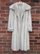 A VINTAGE SILVER / PLATINBLOND MINK THREE-QUARTER LENGTH COAT, fully linedCondition Report: