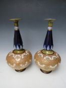 A PAIR OF LARGE ROYAL DOULTON LAMBETH VASES, each decorated with tubelined and painted floral