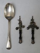 A HALLMARKED SILVER OLD ENGLISH PATTERN TABLE SPOON - LONDON 1914, together with two white metal and