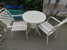 A CAST ALUMINIUM THREE PIECE PATIO BISTRO GARDEN SET COMPRISING TABLE & TWO CHAIRS