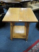 A SMALL OAK ARTS AND CRAFTS OCCASIONAL TABLE
