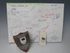 A PAGE OF BRITISH OLYMPIC TEAM MONTREAL 1976 AUTOGRAPHS, together with a small Olympic shield and an