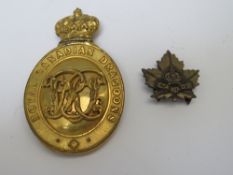 A VICTORIAN ROYAL CANADIAN DRAGOONS HELMET PLATE CENTRE BADGE, with later brooch fitting and a small