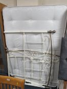 A METAL DOUBLE BED FRAME WITH MATTRESS