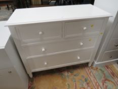 A MODERN FOUR DRAWER WHITE CHEST