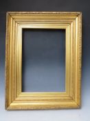 A 19TH CENTURY GOLD FRAME, with acanthus leaf design to outer edge and gold slip, frame W 8 cm, slip