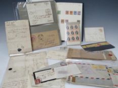 AN ALBUM OF BRITISH STAMPS, together with a quantity of early 19th century postal history and a