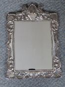 A LARGE HALLMARKED SILVER FRAMED MIRROR, mirror 23 x 17 cm, frame 36 x 24 cm