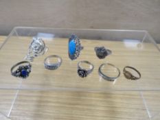 EIGHT ASSORTED SILVER AND WHITE METAL RINGS ETC