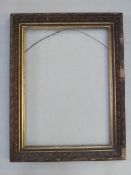 A 19TH CENTURY GOLD FRAME, with leaf design to inner edge and acanthus leaf design to outer edge,