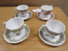 A SET OF ROYAL DOULTON BRAMBLY HEDGE SEASONS DEMITASSE CUPS AND SAUCERS