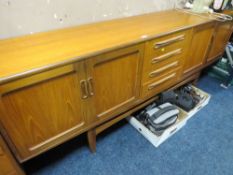 A MID CENTURY TEAK G PLAN SIDEBOARD W- 214CM