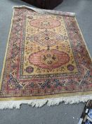 A 20TH CENTURY WOOLLEN RUG DIMENSIONS 170 X 120 CM