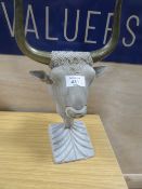 A POLISHED STONE AND METAL GREEK STYLE SCULPTURE OF A BULL