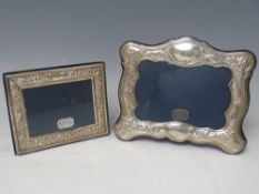TWO HALLMARKED SILVER PHOTOGRAPH FRAMES, site sizes 7 x 12 cm and 6.5 x 9 cm