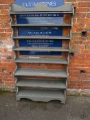 A GREY PAINTED TWO PIECE DISPLAY SHELF