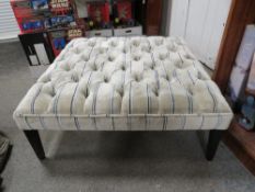 A MODERN LOW LARGE SQUARE FOOTSTOOL