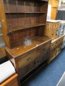 A TRADITIONAL OAK DRESSER