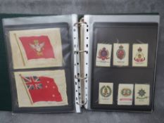 AN ALBUM OF 'BDV' CIGARETTE SILKS, to include flags, military, etc.