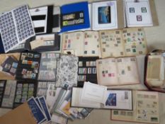 FOUR LARGE ALBUMS OF STAMPS, mainly Royal Wedding / Charles & Di etc., plus a further eight