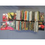 A TRAY OF VINTAGE PULP PAPERBACK BOOKS, to include Mickey Spillane, Hank Janson etc., and vintage
