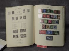 A FOLDER OF ASSORTED STAMPS