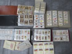 SIX ALBUMS OF CIGARETTE / TEA CARDS, by Wills, Sarony, Sunripe, Cavenders etc., to include vintage