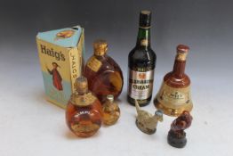 A VINTAGE BOTTLE OF DIMPLE WHISKY IN ORIGINAL BOX, together with a smaller example, Beswick