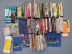 THREE TRAYS OF VINTAGE PAPERBACK BOOKS, one of film tie-ins, one of TV programme tie-ins and one