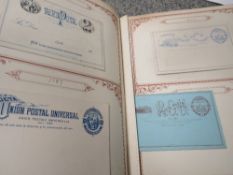 A LATE 19TH CENTURY LINCOLN POSTCARD ALBUM AND CONTENTS, containing a collection of world pre-paid