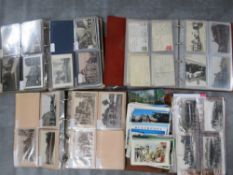 FOUR POSTCARD ALBUMS AND CONTENTS, contents to include vintage examples, British street scenes