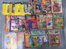 A MIXED LOT OF MAGAZINES AND COMICS, to include eighteen vintage Discovery magazines dated between