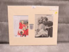 A BOBBY MOORE PICTURE AND SIGNED MAGAZINE PAGE, with certificate of authenticity