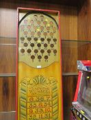 WINNING NUMBERS, A MID 20TH CENTURY PAINTED WOOD FAIRGROUND BAGATELLE TYPE GAME BOARD, painted
