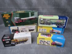 A TRAY CONTAINING SIX BOXED CORGI VEHICLES, to include Eddie Stobart Atkinson Borderer flatbed