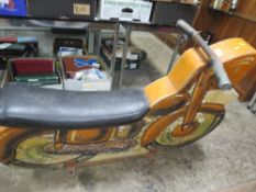 A FAIRGROUND PAINTED WOOD CAROUSEL MOTORBIKE, with polychrome decoration, on metal bracket stand (