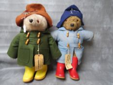 A VINTAGE GABRIELLE DESIGNS PADDINGTON BEAR, green jacket with brown hat and yellow Dunlop wellies,