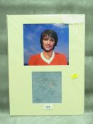 A GEORGE BEST PICTURE WITH AUTOGRAPHED DENIM, dated 1994, with certificate of authenticity