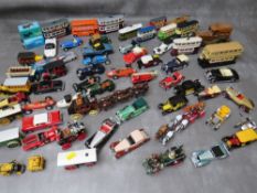 A TRAY OF UNBOXED DIE CAST A TRAY OF UNBOXED DIE CAST VEHICLES, to include cars, buses, trams,