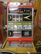 A VINTAGE JUBILEE INTERNATION 'TIC TAC TOE' COIN OPERATED ONE ARM BANDIT, 66 x 46 cm