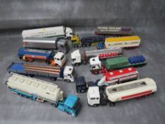 TWELVE UNBOXED ARTICULATE LORRIES AND TRAILERS / TANKERS, mixed makes to include Tenko, Corgi etc.