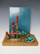 A POPCORN ENGINE ON WOODEN PLINTH, with build instructions / plans