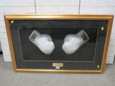 A PAIR OF FRAMED BOXING GLOVES FROM A LONDON SHOW WITH MULTIPLE SIGNATURES, to include Terry