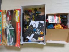 A BOXED MICRO SCALEXTRIC, with track, cars, transformer and hand controls, together with a box of