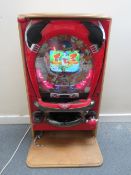 A VINTAGE JAPANESE ? WALL MOUNTED ELECTRICAL WOODY WOODPECKER ARCADE PINBALL MACHINE, with key and
