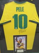 A FRAMED PELE FOOTBALL SHIRT AND PHOTOGRAPH, both signed